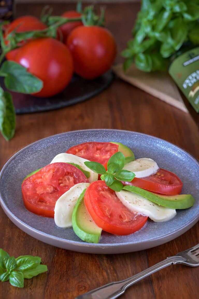 Caprese Avocado salad with basil and mozzarella